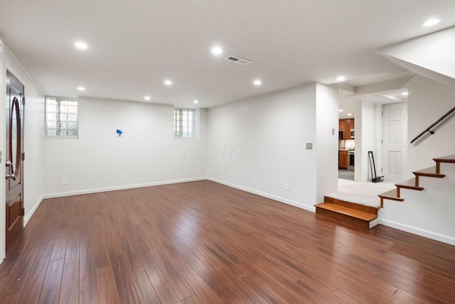 249 E Whittier St, Columbus, OH 43206 - below grade area featuring stairway, recessed lighting, healthy amount of natural light, and dark wood-type flooring