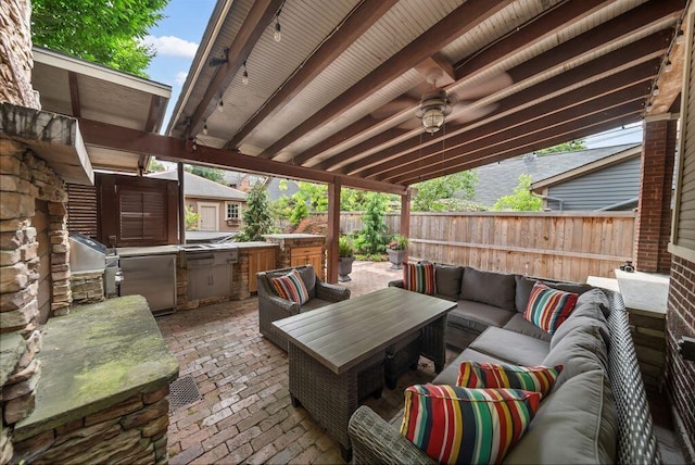 249 E Whittier St, Columbus, OH 43206 - fenced backyard featuring outdoor lounge area, area for grilling, and a patio