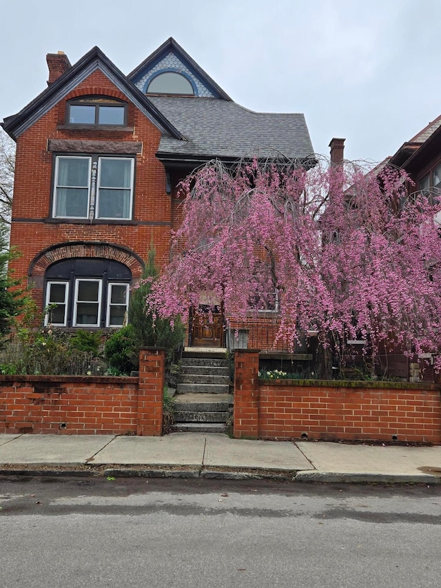 726 Franklin Ave, Columbus, OH 43205 - view of front facade featuring brick siding and a chimney