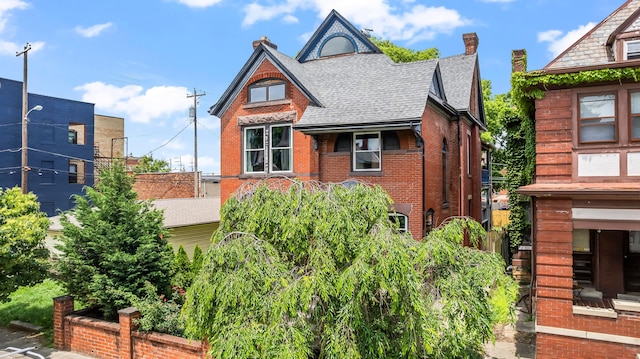 726 Franklin Ave, Columbus, OH 43205 - view of front of house with brick siding and a shingled roof