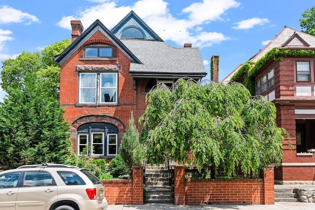 726 Franklin Ave, Columbus, OH 43205 - view of front of house featuring brick siding, a chimney, and roof with shingles