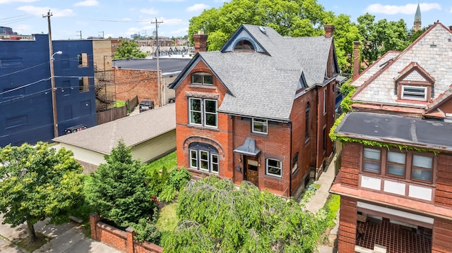 726 Franklin Ave, Columbus, OH 43205 - view of front of property with a chimney, a shingled roof, and brick siding