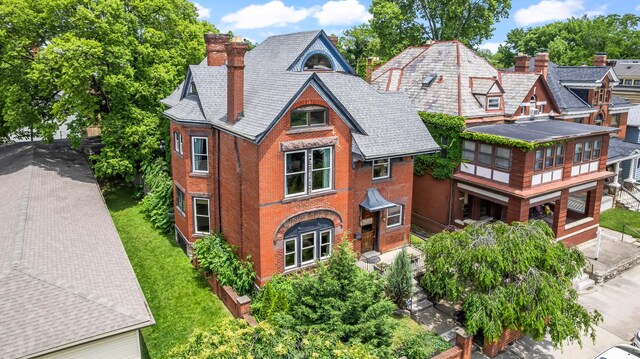 726 Franklin Ave, Columbus, OH 43205 - view of front of home featuring a chimney, brick siding, and a high end roof