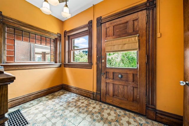 726 Franklin Ave, Columbus, OH 43205 - entryway featuring baseboards and tile patterned floors