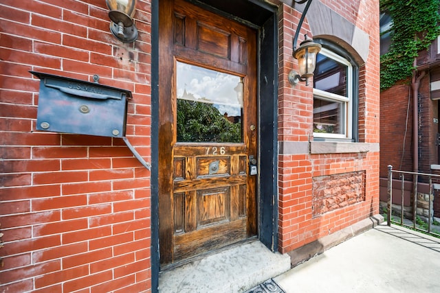 726 Franklin Ave, Columbus, OH 43205 - property entrance featuring brick siding and covered porch