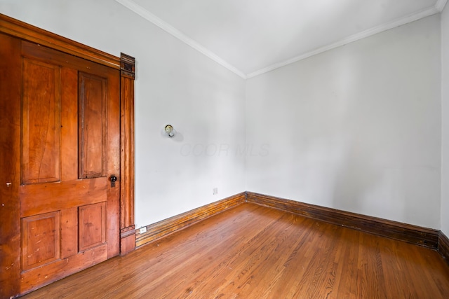 726 Franklin Ave, Columbus, OH 43205 - spare room featuring light wood finished floors and crown molding