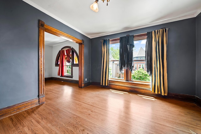 726 Franklin Ave, Columbus, OH 43205 - spare room featuring wood finished floors and crown molding