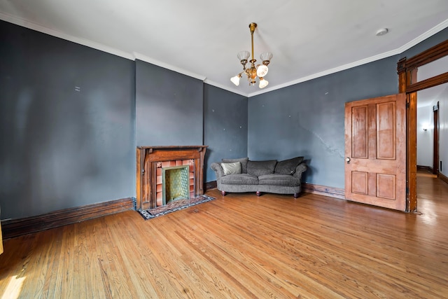 726 Franklin Ave, Columbus, OH 43205 - living area featuring a chandelier, wood finished floors, and crown molding