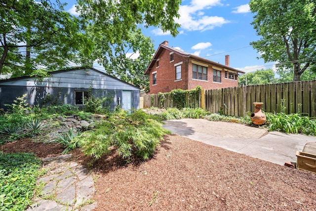 726 Franklin Ave, Columbus, OH 43205 - rear view of house featuring a chimney and brick siding