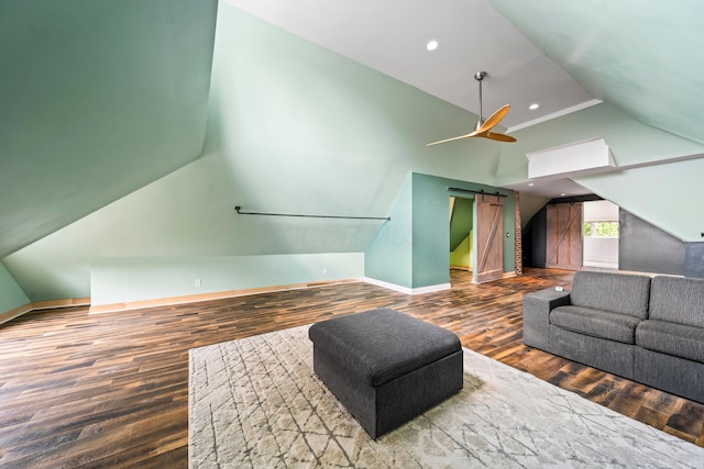 726 Franklin Ave, Columbus, OH 43205 - additional living space featuring lofted ceiling, wood finished floors, a barn door, and recessed lighting
