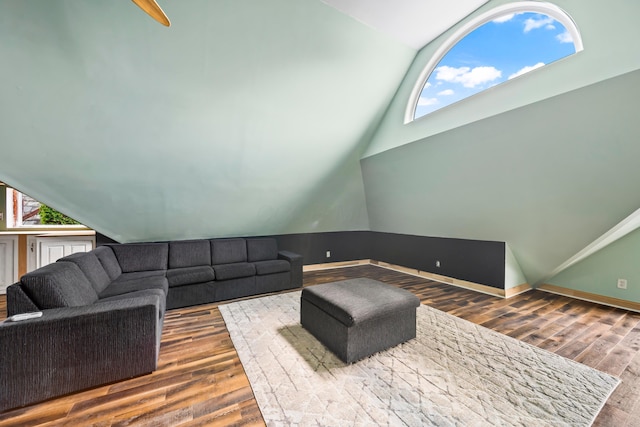 726 Franklin Ave, Columbus, OH 43205 - living room with vaulted ceiling, wood finished floors, and plenty of natural light