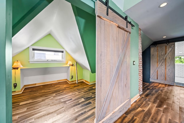 726 Franklin Ave, Columbus, OH 43205 - additional living space featuring a barn door, vaulted ceiling, wood finished floors, and recessed lighting