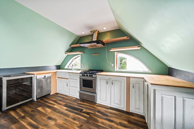 726 Franklin Ave, Columbus, OH 43205 - kitchen with stainless steel appliances, wine cooler, open shelves, vaulted ceiling, and plenty of natural light