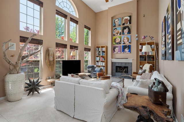 5650 Tynecastle Loop, Dublin, OH 43016 - living room with a towering ceiling, a fireplace, and carpet