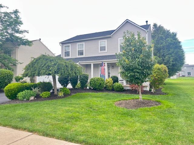 1768 Fern Trail Dr, Lancaster, OH 43130 - view of front of house featuring a front lawn