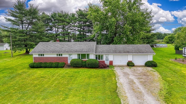 3180 Sitterley Rd NW, Canal Winchester, OH 43110 - single story home featuring dirt driveway, an attached garage, a front lawn, and a chimney