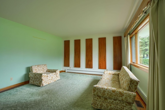 3180 Sitterley Rd NW, Canal Winchester, OH 43110 - sitting room featuring a baseboard heating unit and carpet floors