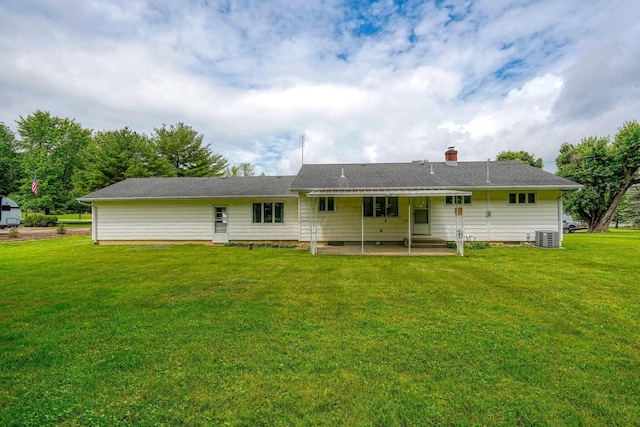 3180 Sitterley Rd NW, Canal Winchester, OH 43110 - rear view of house with a patio area and a lawn