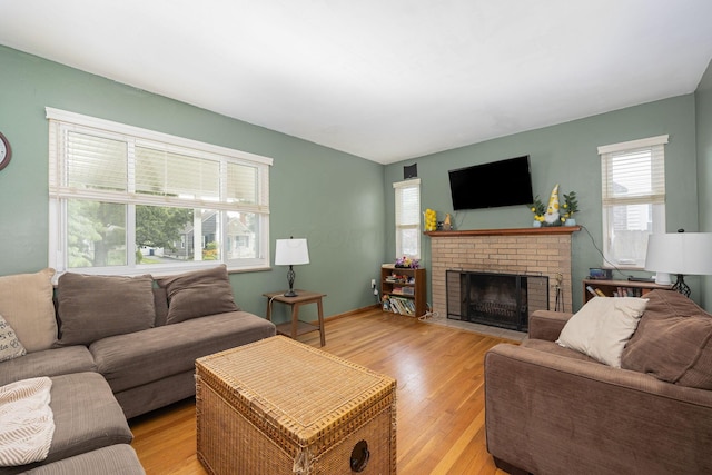 335 Letchworth Ave, Columbus, OH 43204 - living room featuring plenty of natural light, light wood-style flooring, and a fireplace