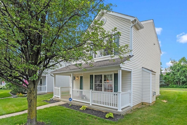 7780 Freesia St Unit 228, Blacklick, OH 43004 - view of front facade featuring a porch and a front yard