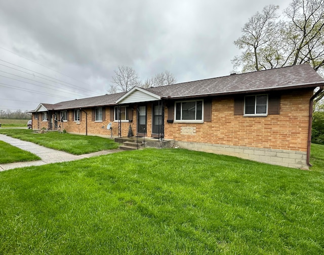 490 N Jay St, West Milton, OH 45383 - single story home with brick siding, a front lawn, and roof with shingles