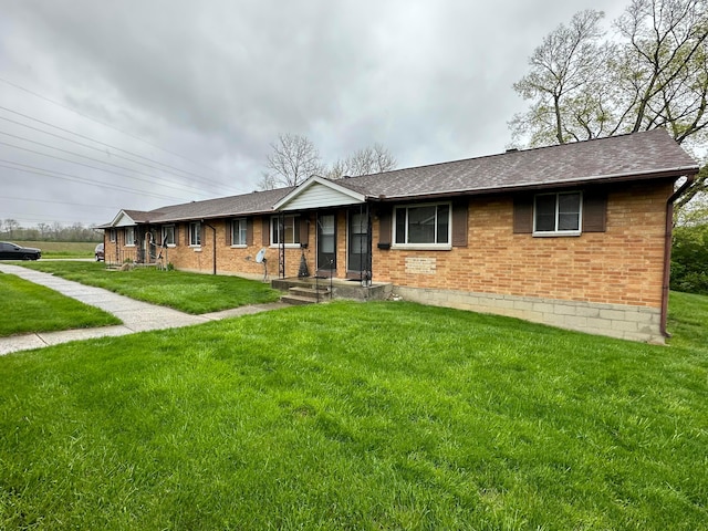 488 N Jay St, West Milton, OH 45383 - ranch-style house featuring brick siding, a front lawn, and a shingled roof