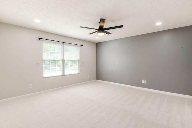 5595 Marshfield Dr, Westerville, OH 43081 - unfurnished room featuring a ceiling fan, light colored carpet, recessed lighting, and a textured ceiling