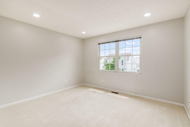 5595 Marshfield Dr, Westerville, OH 43081 - unfurnished room featuring light carpet and recessed lighting