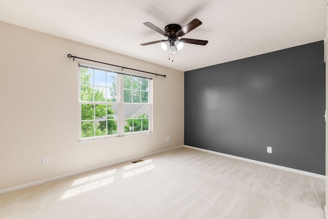 5595 Marshfield Dr, Westerville, OH 43081 - empty room featuring a ceiling fan and light carpet