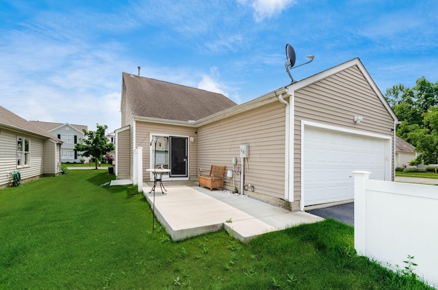 5595 Marshfield Dr, Westerville, OH 43081 - rear view of property with a yard, driveway, and a garage