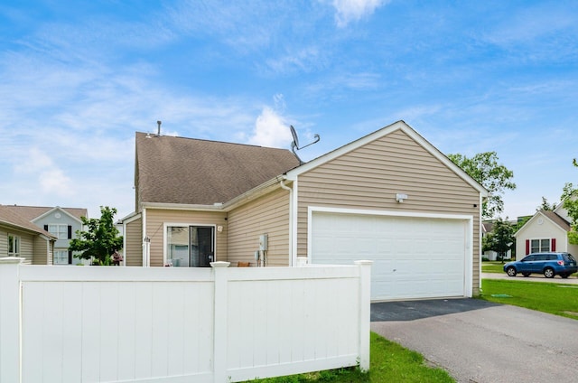 5595 Marshfield Dr, Westerville, OH 43081 - view of front of property with driveway, a garage, and roof with shingles