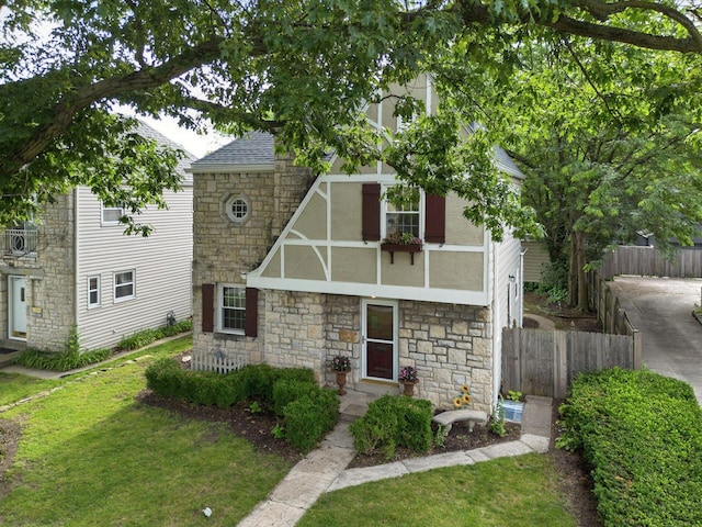 208 S Stanwood Rd, Bexley, OH 43209 - tudor-style house featuring stone siding