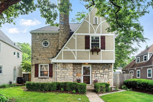 208 S Stanwood Rd, Bexley, OH 43209 - english style home with stone siding, stucco siding, and a chimney