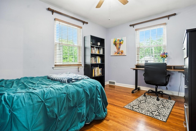 208 S Stanwood Rd, Bexley, OH 43209 - bedroom featuring wood finished floors, an office area, and a ceiling fan