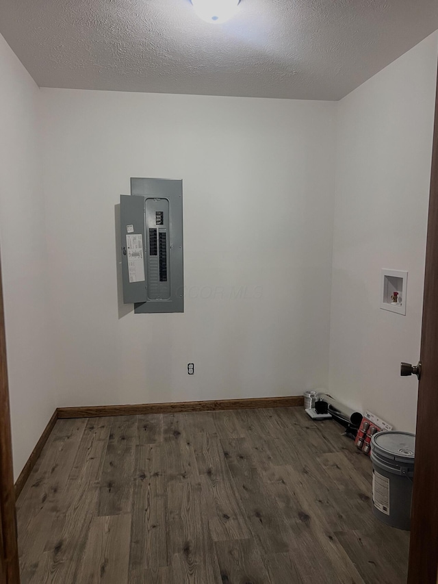 623 Glencroft Ave, Chillicothe, OH 45601 - unfurnished room featuring electric panel, wood finished floors, and a textured ceiling