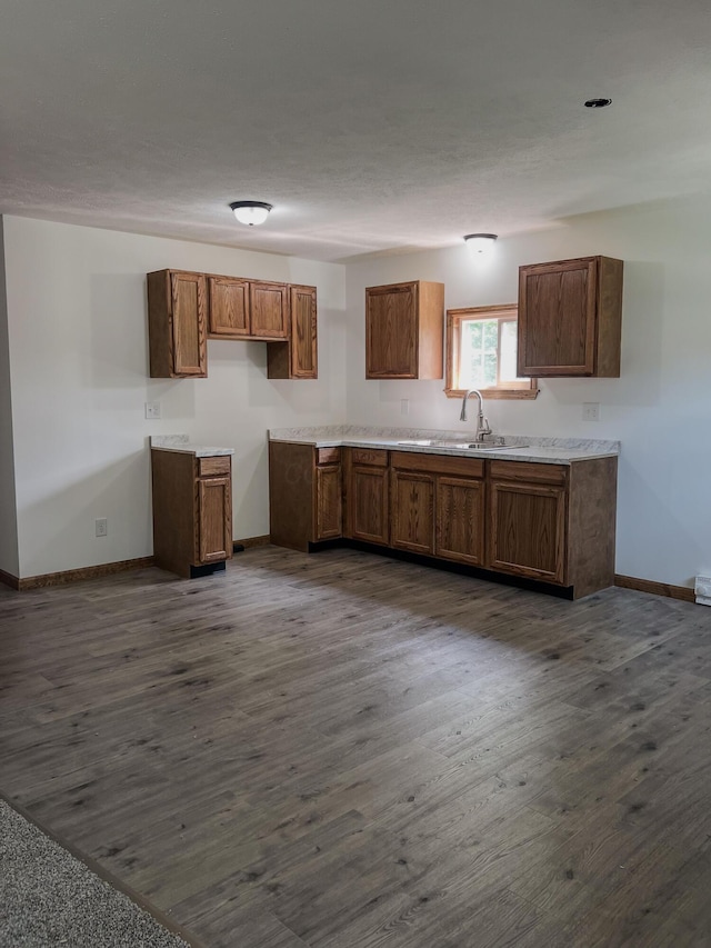 623 Glencroft Ave, Chillicothe, OH 45601 - kitchen with brown cabinetry and dark wood-style floors