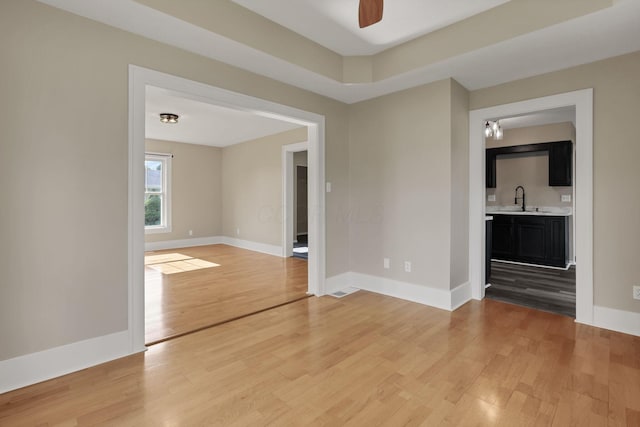 156 E Postal Ave, Newark, OH 43055 - empty room featuring light wood-style flooring and a ceiling fan