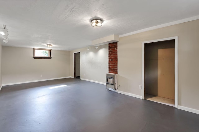 156 E Postal Ave, Newark, OH 43055 - basement with heating unit and a textured ceiling