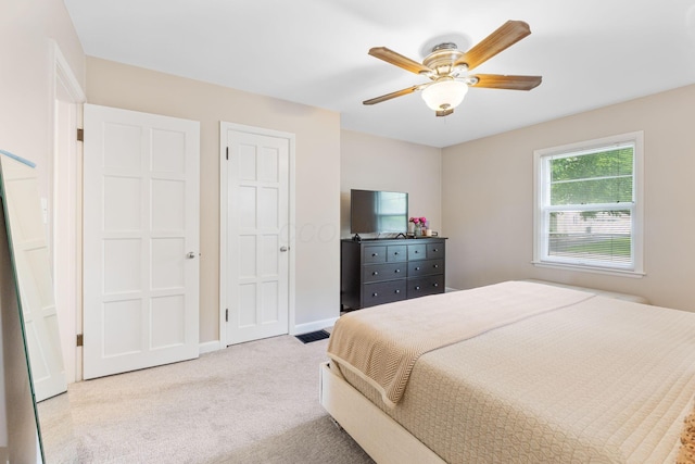 2222 Harwitch Rd, Columbus, OH 43221 - carpeted bedroom featuring baseboards and ceiling fan