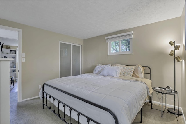5252 Roche Pl, Columbus, OH 43229 - carpeted bedroom with baseboards and a textured ceiling