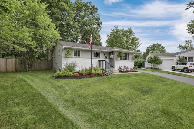 5252 Roche Pl, Columbus, OH 43229 - view of front facade featuring brick siding and driveway