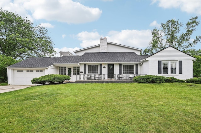 2361 Middlesex Rd, Upper Arlington, OH 43220 - view of front facade with an attached garage, a chimney, a front lawn, and concrete driveway