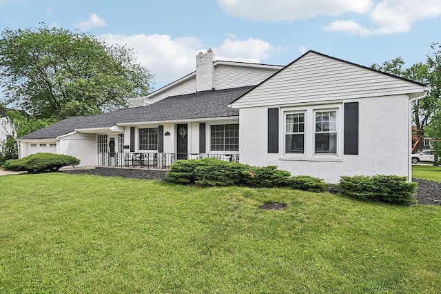 2361 Middlesex Rd, Upper Arlington, OH 43220 - view of front of house with an attached garage, a front yard, a chimney, and a shingled roof