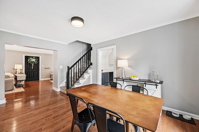 2361 Middlesex Rd, Upper Arlington, OH 43220 - dining area featuring stairway, ornamental molding, and wood finished floors