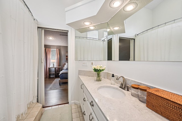 2361 Middlesex Rd, Upper Arlington, OH 43220 - bathroom with vanity, tile patterned flooring, and ensuite bathroom