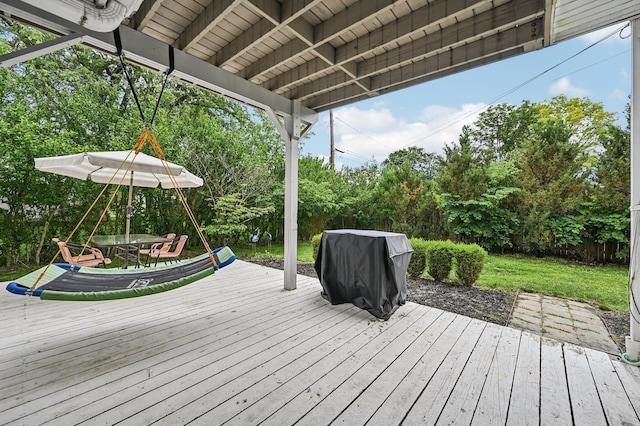 2361 Middlesex Rd, Upper Arlington, OH 43220 - wooden deck featuring area for grilling, view of scattered trees, and outdoor dining area