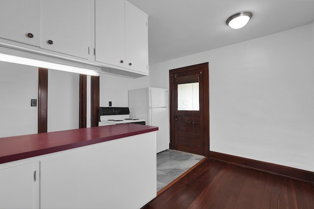 629 E Chestnut St, Lancaster, OH 43130 - kitchen with white appliances, dark wood-style flooring, and white cabinetry