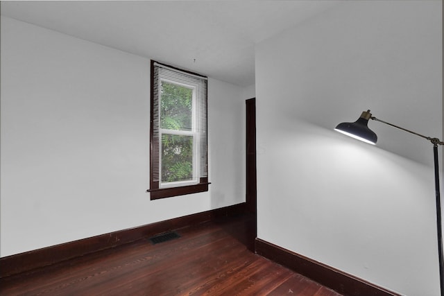 629 E Chestnut St, Lancaster, OH 43130 - empty room featuring wood finished floors and baseboards
