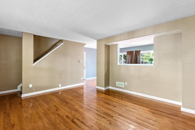 7701 Kelvinway Dr Unit 74, Columbus, OH 43085 - spare room featuring wood finished floors and a textured ceiling