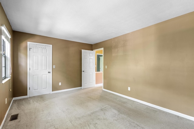 7701 Kelvinway Dr Unit 74, Columbus, OH 43085 - unfurnished bedroom with carpet flooring